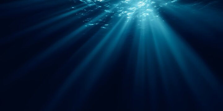 A dark blue background with rays of light shining down, creating an underwater effect. - Powered by Adobe