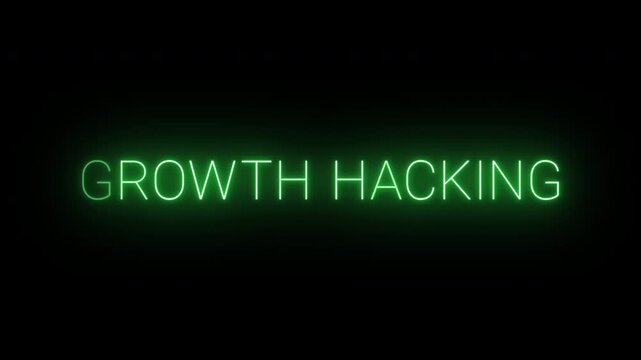 Flickering neon green growth hacking sign animated on black background.
