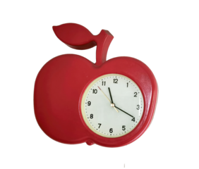 Red apple shaped wall clock with white dial and black hands isolated on transparent PNG background. Bright and colorful clock, perfect for kitchen or classroom.