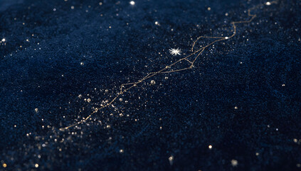 Golden star constellation on dark blue glitter background