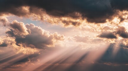 golden sunlight rays breaking through clouds