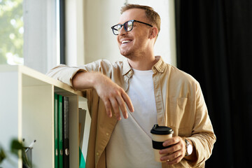 Young businessman enjoys a moment of relaxation while working in a modern office environment