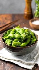Roasted green beans in a bowl, seasoned with salt