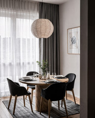 Japandi Dining Area with Round Table and Ceramic Dinnerware