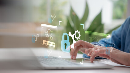 Businessman typing on laptop with cybersecurity system, lock and gear icon. Concept of IT security, global data protection, network safety and digital infrastructure management.
