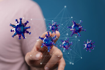 Hand interacting with a 3D model of viruses, visualizing connections and networks.