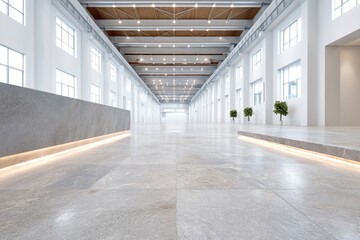Large, empty room with a white counter and a few potted plants.