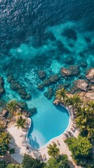 Fototapeta premium A long pool with crystal clear water, surrounded by tropical greenery and palm trees. In demand for tourist brochures, hotel advertising, and landscape design.