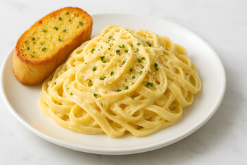 Creamy Fettuccine Alfredo Pasta with Garlic Bread on White Plate