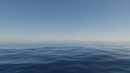 Fototapeta premium A wide-angle shot of blue water under a clear sky, highlighting the vast, calm sea and the unobstructed sky above.