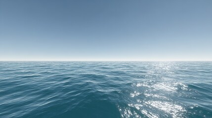 Fototapeta premium A wide-angle shot of blue water under a clear sky, highlighting the vast, calm sea and the unobstructed sky above.