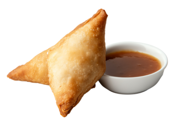 Delicious golden fried samosas served with savory dipping sauce, isolated on a white background.