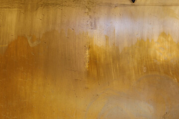High-resolution image of golden brass metal texture. Perfect for backgrounds, design projects, and more.