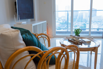 The apartment consists of two bedrooms. The master bedroom features a comfortable queen-size bed. The second bedroom has a single bed. The living room features an elegant design with a modern minimali