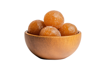 Sweet round dessert balls in a wooden bowl, perfect for a festive or traditional feast.