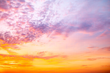 Beautiful , luxury soft gradient orange gold clouds and sunlight on the blue sky perfect for the background, take in evening,Twilight, Large size, high definition landscape photo