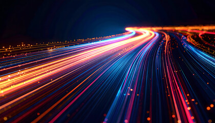 Obraz premium Abstract Light Trails in Motion: Vibrant Colorful Streaks on a Dark Background