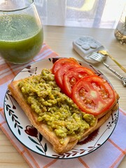 Avocado toast with tomatoes