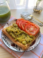 Avocado toast with tomatoes
