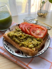 Avocado toast with tomatoes