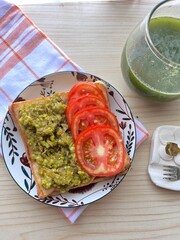 Avocado toast with tomatoes