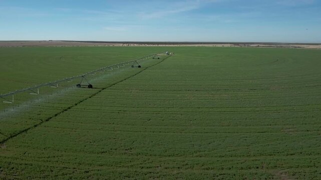 Yuma Arizona USA &ndash; 4K Drone Aerial of Irrigation and Circular Crop Fields with Tractors