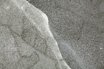 texture of ice on the lake, macro view, natural background