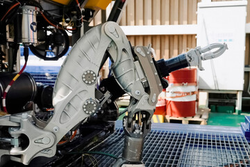 Deep-sea robotic manipulator for technical work on wellhead underwater on an oil drilling offshore platform.
