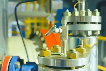 small sampling and pressure relief valve on the flange connection of the pressure vessel nozzle. LNG Plant