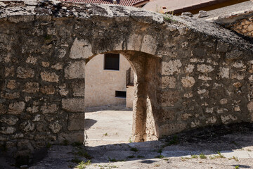 Arched doorway (Sacramenia, Spain), July 11, 2025. Arch in a street in the small town of Sacramenia, in the province of Segovia.