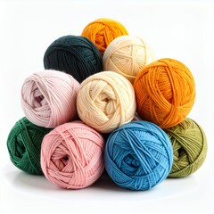 Assortment of colorful yarn balls creating a soft, vibrant textile stack on white background