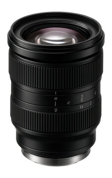 Variable aperture zoom lens with a lightweight polycarbonate body and lens barrel markings