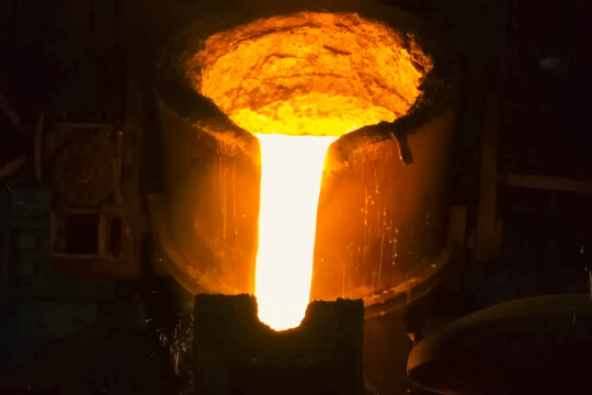 Ladle with molten iron pouring steel blast furnace workshop.