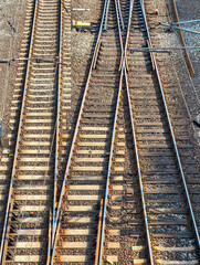 Railway Tracks Aerial View: Dynamic Urban Infrastructure Featuring Intricate Patterns and Modern Design for Digital Backdrops, Wallpaper, Marketing, and Travel Photography Uses Worldwide