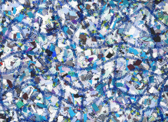 Recycling background. Quilt of recycled textile. No waste. Blue background. Recycling fabric....