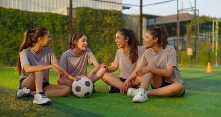 Indian asian happy athlete girl woman player group sitting take break after game talk gossip...