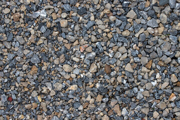 texture of gravel stones on ground background	
