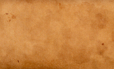 old brown paper with grunge spots - texture background