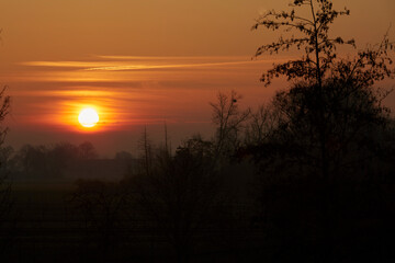 Fototapeta premium Sonnenaufgang in Lippstadt Overhagen im Kreis Soest