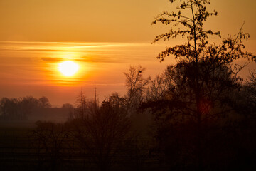 Fototapeta premium Sonnenaufgang in Lippstadt Overhagen im Kreis Soest