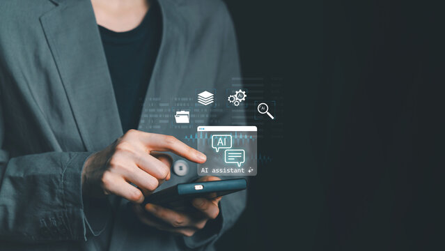 Businessman using smartphone with AI assistant icons. Concept of virtual assistant, chatbot, artificial intelligence interaction, and smart communication for business automation.