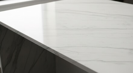 Obraz premium Close-up of a sleek, white marble countertop with subtle grey ve