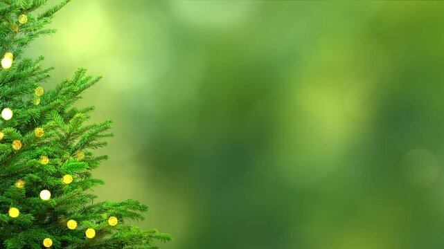 christmas tree border with golden bokeh lights isolated on empty green blurred background with copy space