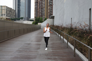 Asian Indian adult woman urban rooftop outdoor casual pose walk talk activity friend colleague various expression