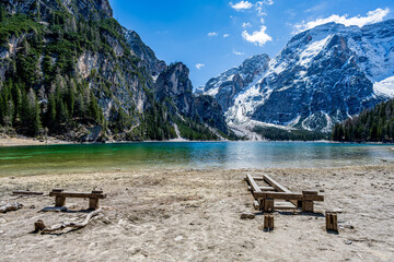 Small lonely beach at Lake Braies, Lake Prags, Lake Braies, Lago di Braies,Pragser Wildsee in the Dolomites in South Tyrol, Italy. Hiking and holidays in South Tyrol.