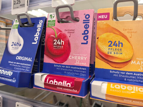 Colorful lip care products displayed in a vibrant retail setting