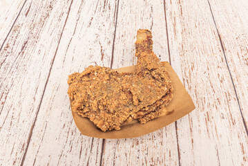 Roasted chicken with Moroccan spices and candied lemon, accompanied by fries seasoned