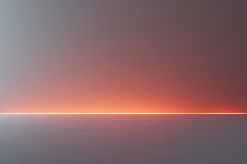 Obraz premium Horizon line with orange glow over calm water light