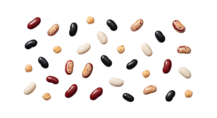 Assorted colorful beans scattered on a seamless black background