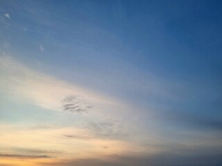 Beautiful white clouds and orange sky on the blue sky perfect in the afternoon for the background
